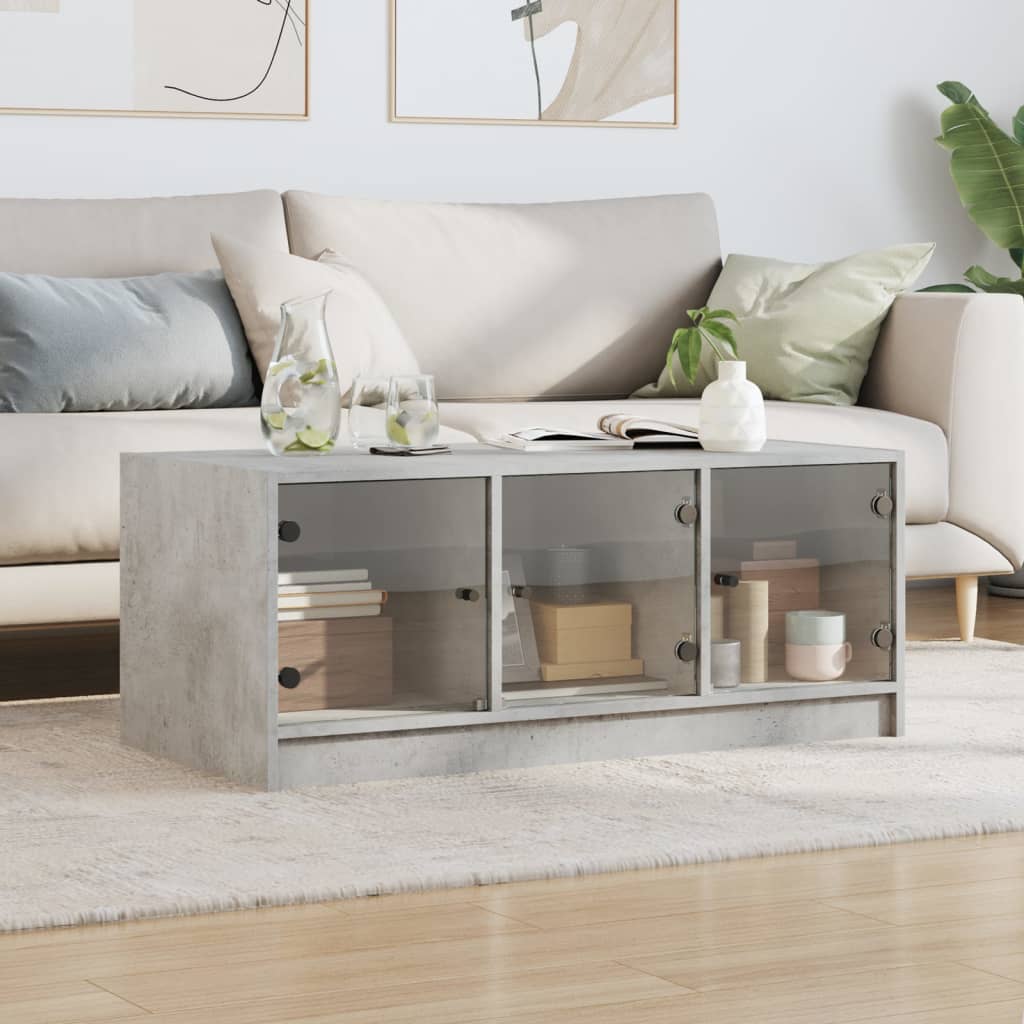 Table basse avec portes en verre gris béton 102x50x42 cm