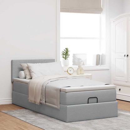 Lit ottoman avec matelas gris clair 90x200 cm tissu