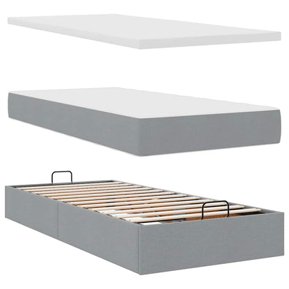 Lit ottoman avec matelas gris clair 90x200 cm tissu