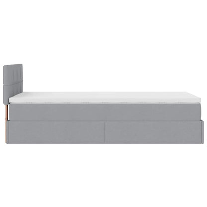 Lit ottoman avec matelas gris clair 90x200 cm tissu