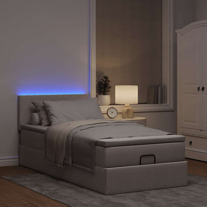 Lit ottoman avec matelas et LED taupe 90x200 cm tissu