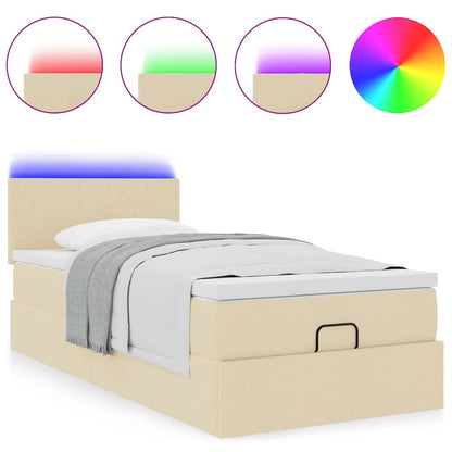 Lit ottoman avec matelas et LED crème 90x200 cm tissu