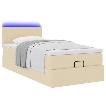 Lit ottoman avec matelas et LED crème 90x200 cm tissu