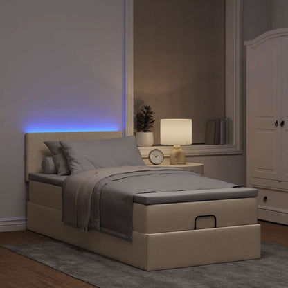 Lit ottoman avec matelas et LED crème 90x200 cm tissu