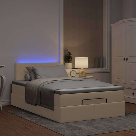 Lit ottoman avec matelas et LED crème 120x190 cm tissu