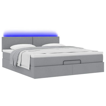 Lit ottoman avec matelas et LED Gris clair 180x200 cm tissu