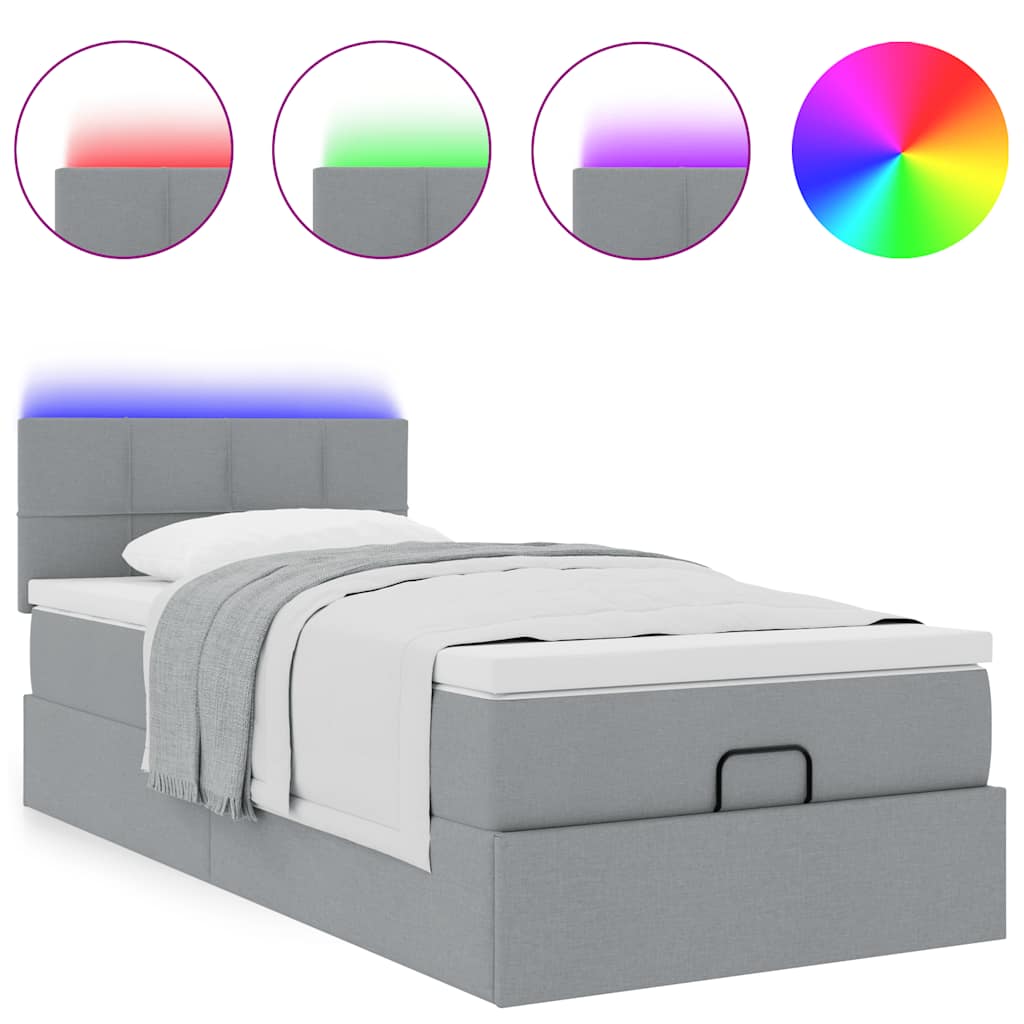 Lit ottoman avec matelas et LED gris clair 90x200 cm tissu