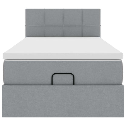 Lit ottoman avec matelas et LED gris clair 90x200 cm tissu