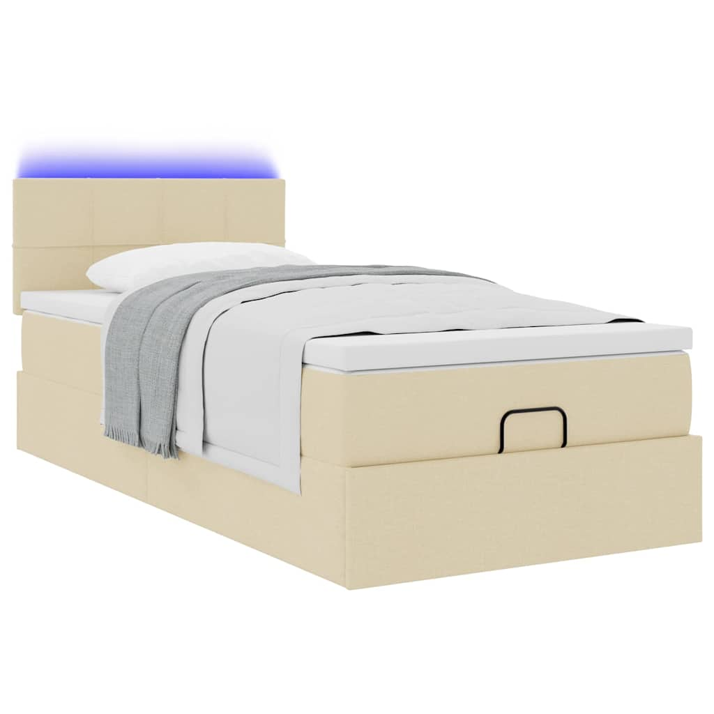 Lit ottoman avec matelas et LED crème 90x200 cm tissu