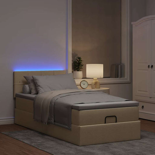 Lit ottoman avec matelas et LED crème 90x200 cm tissu