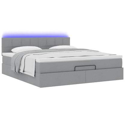 Lit ottoman avec matelas et LED Gris clair 180x200 cm tissu