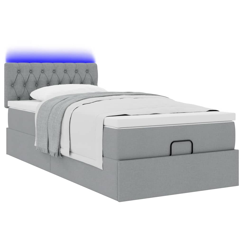 Lit ottoman avec matelas et LED gris clair 90x200 cm tissu