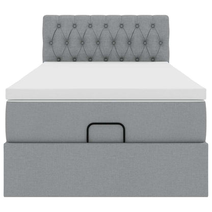 Lit ottoman avec matelas et LED gris clair 90x200 cm tissu