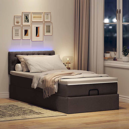 Lit ottoman avec matelas et LED marron foncé 90x200 cm tissu