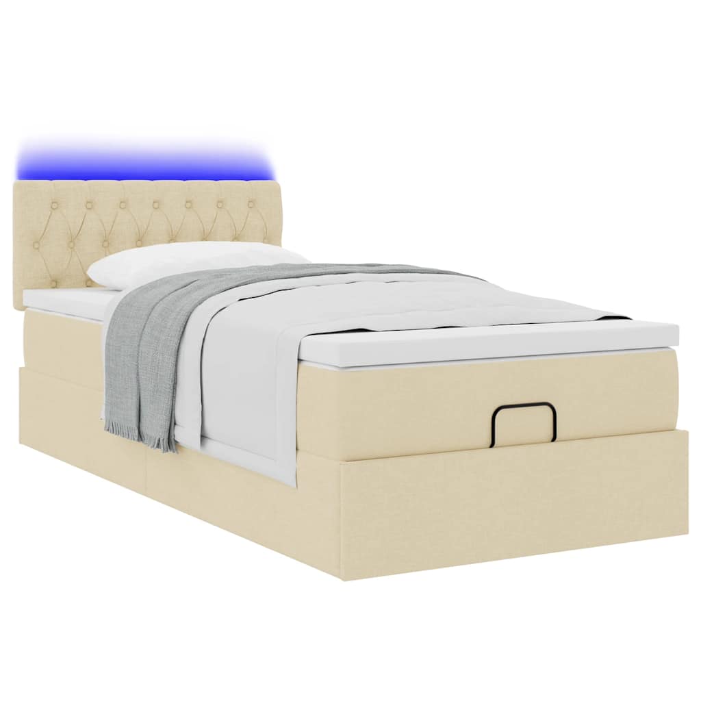 Lit ottoman avec matelas et LED crème 90x200 cm tissu