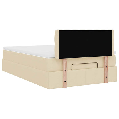 Lit ottoman avec matelas et LED crème 120x190 cm tissu