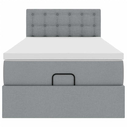 Lit ottoman avec matelas et LED gris clair 90x200 cm tissu