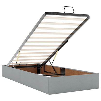 Lit ottoman avec matelas et LED gris clair 90x200 cm tissu