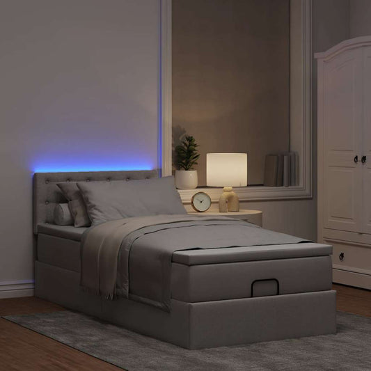 Lit ottoman avec matelas et LED taupe 90x200 cm tissu