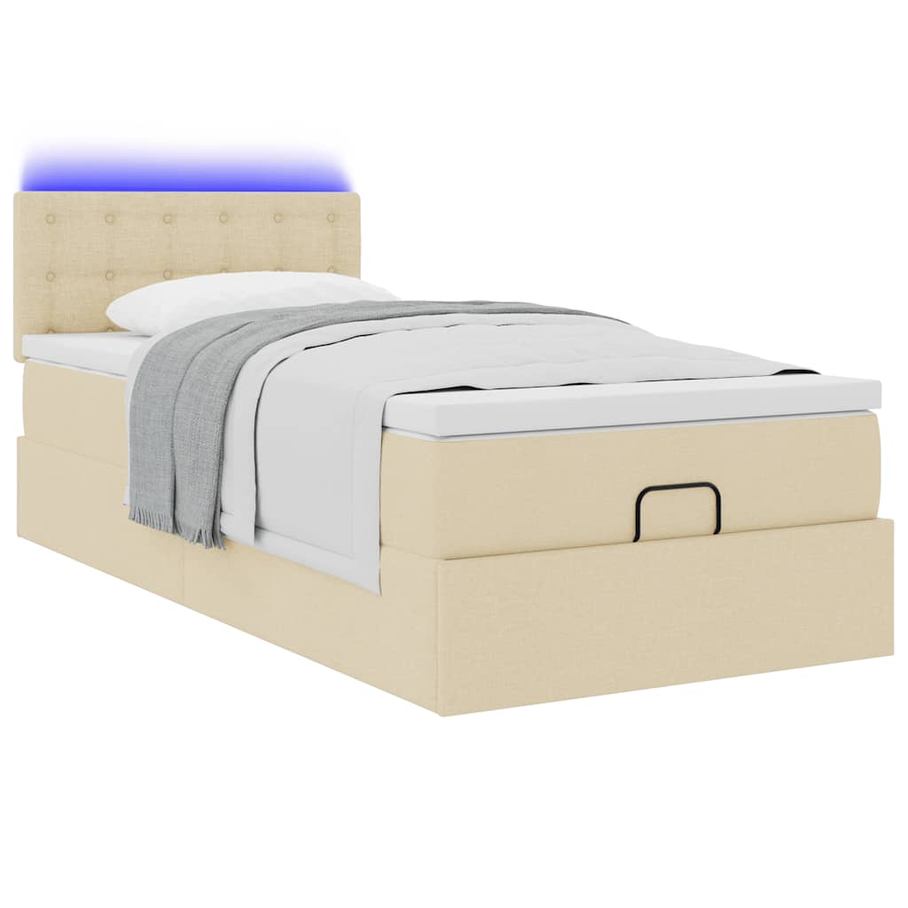 Lit ottoman avec matelas et LED crème 90x200 cm tissu