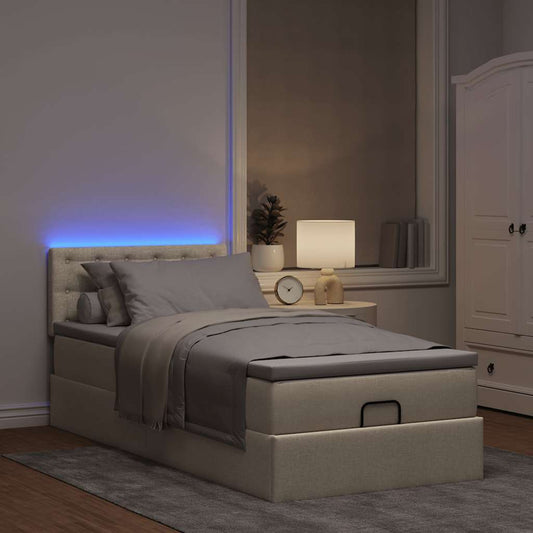 Lit ottoman avec matelas et LED crème 90x200 cm tissu